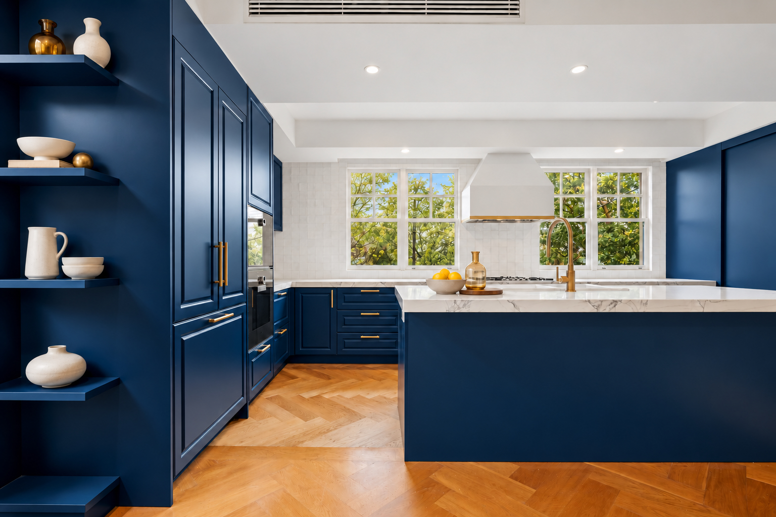 Refined navy kitchen with brass accents in Hawthorn