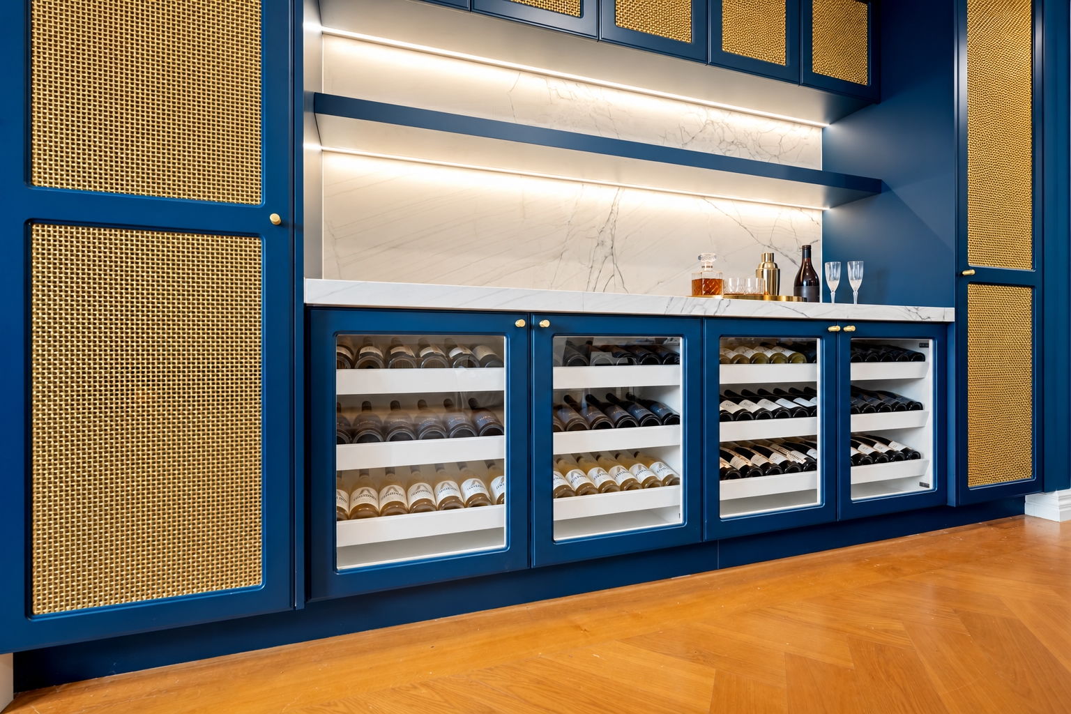Navy drinks cabinet with polished brass bar